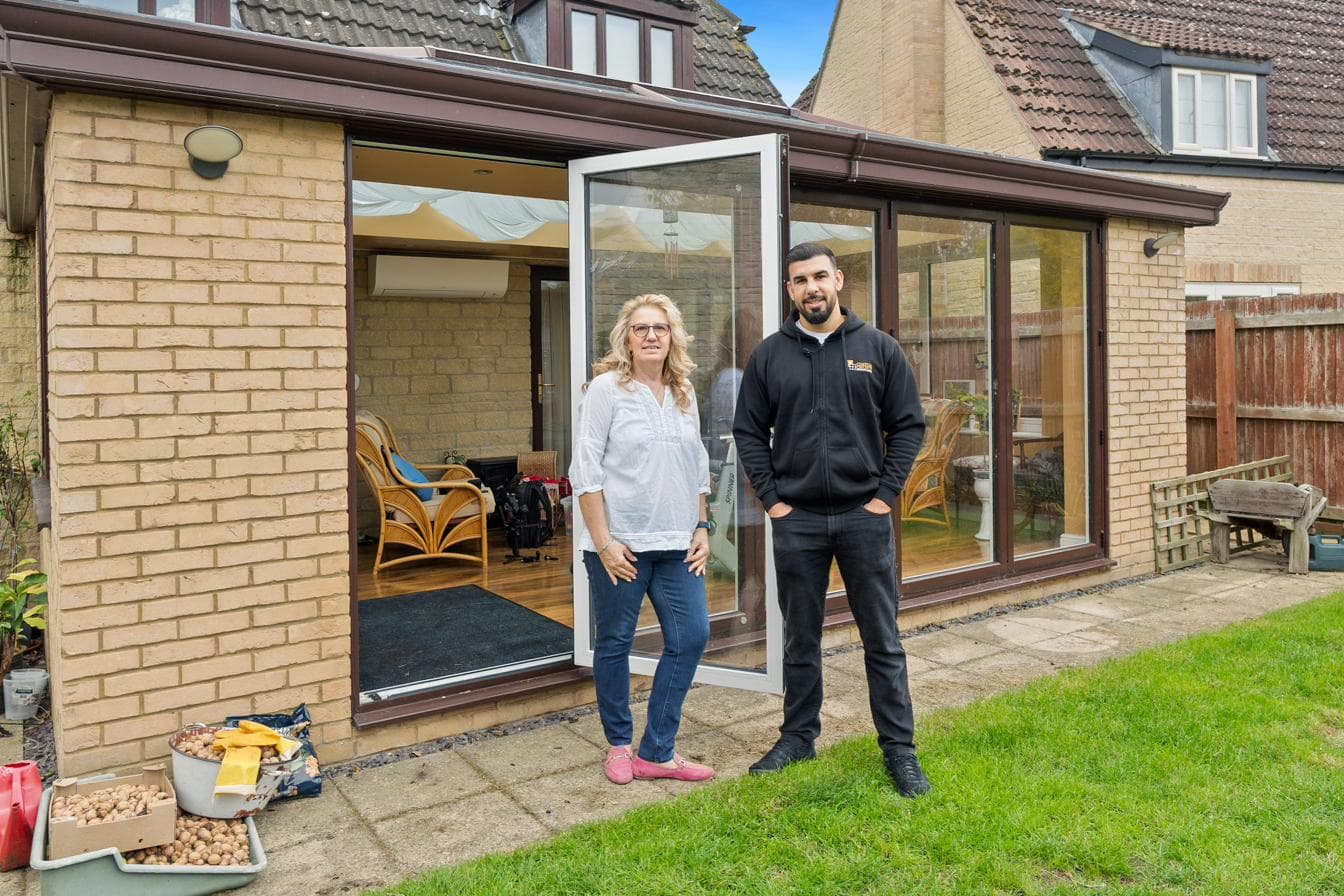 Tariq Quaddus of Custom Choice with a Peterborough homeowner at her Origin aluminium door installation