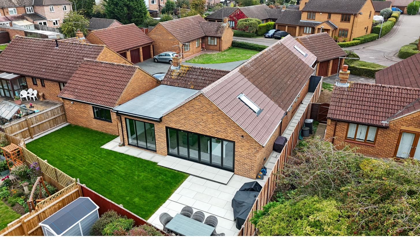 Aerial view of a single-storey extension with bifold doors and picture windows on a bungalow in Werrington