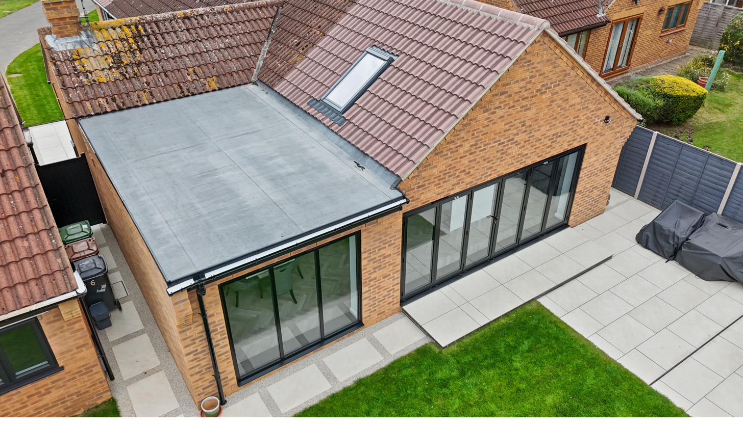 Aluminium sliding doors and picture window on a Peterborough rear extension by Custom Choice
